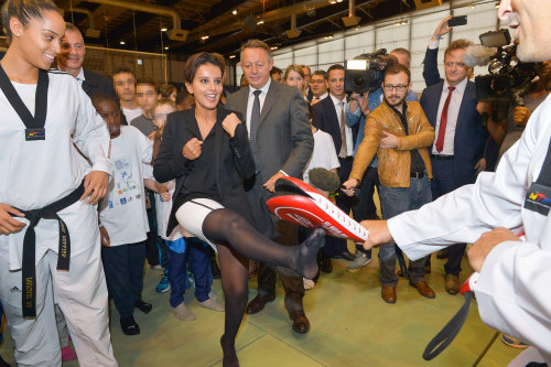 arabcocksuckers:Truly amazing picture of French-Moroccan education minister Najat Vallaud-Belkacem trying some karaté in stocking feet during an official visit while wearing black tights with reinforced toes.