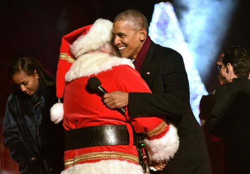 The Obamas lit their final National Christmas Tree as the first family Thursday night.(photo: Getty)