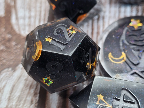 dicekatdice: Heavenly BodiesThese dice are unsanded/polished and unpainted.