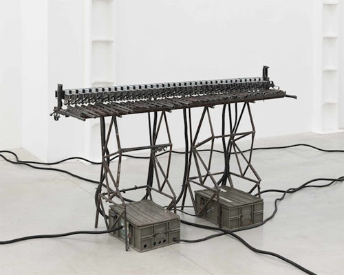 creewillow:  2headedsnake:  Pedro Reyes and new media studio Cocolab are turning dismantled weapons into mechanized musical instruments. Click the link to see/hear the video.  whhhh 