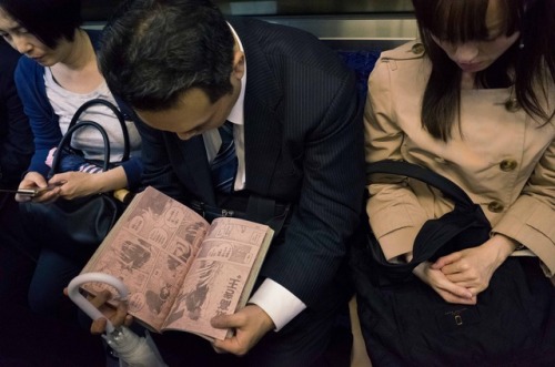 Some light reading on the tube. Tokyo