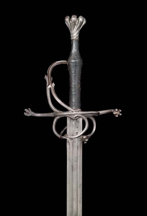 mindhost:  16th century German longsword with complex guardSource: christies.com