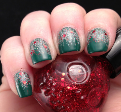 astudyinpolish:
“ Yesterday’s Christmas mani… And a glitter polish in a Jack Skellington bottle from Hot Topic. :o
”