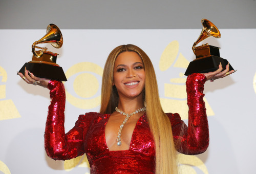 celebsofcolor: Beyonce poses with her Grammy trophies in the press room during the 59th Annual Gramm