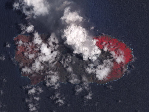 An aerial view of the eruption of Mount Anatahan, 2008.