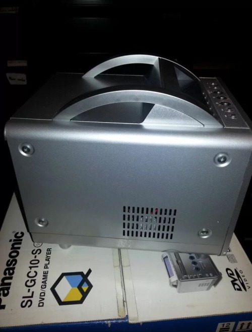 ask-cloud-skipper:  whitetail-music:  isquirtmilkfrommyeye:To help in their competition against the Xbox and PS2, Nintendo teamed up with Panasonic in December of 2001 to include a DVD player to the GameCube. This new version of the GameCube was called