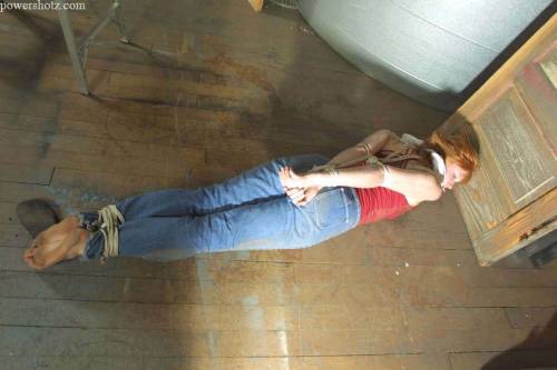 zippo077:  Abducted off the street and kept in a grimy warehouse before being shipped overseas, Katherine makes a desperate attempt to escape. In her struggles she  only succeeds in losing her flip flops and getting filthy from rolling around on the