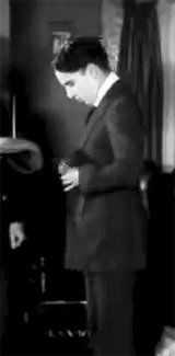 chaplinfortheages:  royallymonroe:  Charlie Chaplin looking extremely handsome in