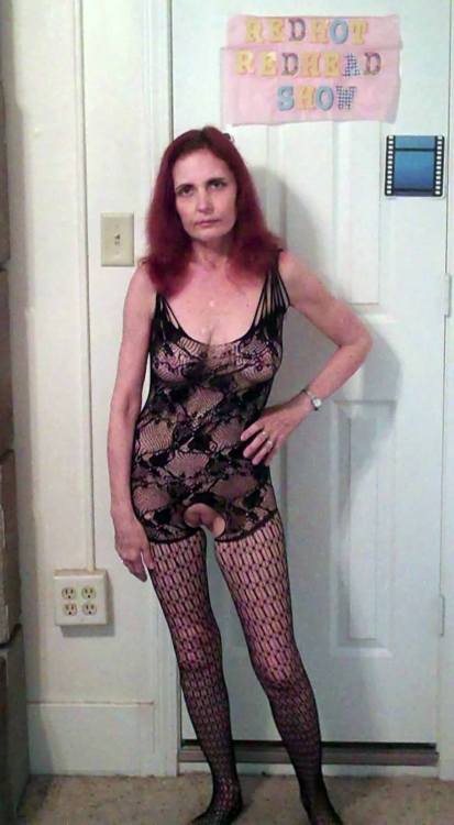 showoffmyslut: Posing in public on a rainy day wearing her new body-stocking (and a couple indoor s