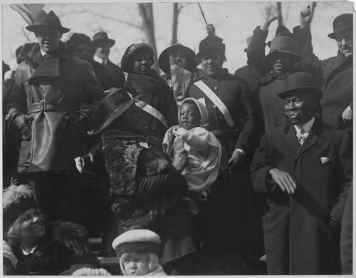 todaysdocument: Relatives and friends cheering the 369th Infantry as they pass in parade. New York C