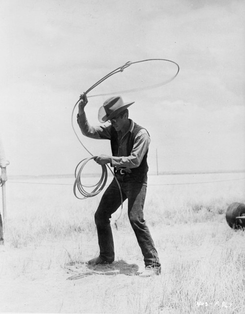 vintageeveryday: James Dean practicing with lasso on the set of ‘Giant’, 1955.