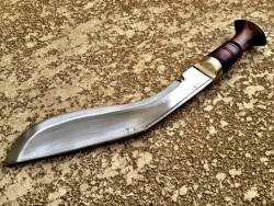 gunsknivesgear:  Gurkha Kukri. Pros: Forward cant of the blade enables heavier decapitating strikes. Cons:  Weight-forward blade means that it is not as quick or “lively” in the hand as other blade styles. The kukri excels at one thing: it is a beastly