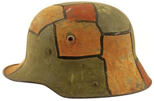 German M-16 stahlhelm with disruptive camouflage paint, World War I.from Amoskeag Auctions