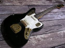 glorifiedguitars: Jaguar or Jazzmaster - as requested!  1992 Fender Japan Jaguar 30th Anniversary Black &amp; Gold Limited Edition  [Source: Shelton’s Guitars]  