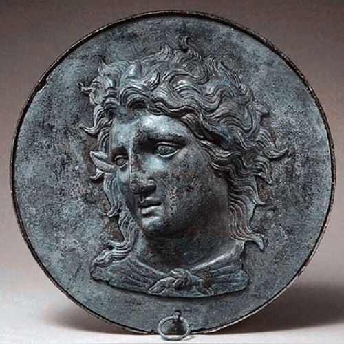Box mirror with the head of Pan, late 4th century b.c.; Hellenistic Greek, Bronze.•Box mirrors, like