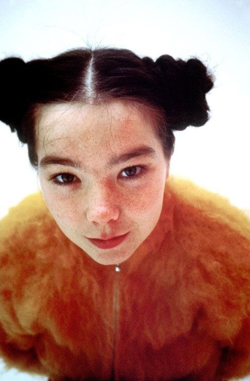 itsabjorkchristmas:  Björk and her fuzzy orange/yellow sweater 