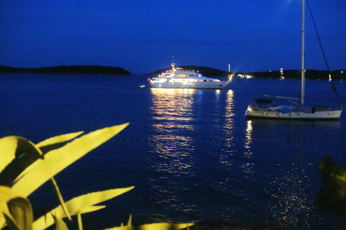 Yacht lights in the water. 