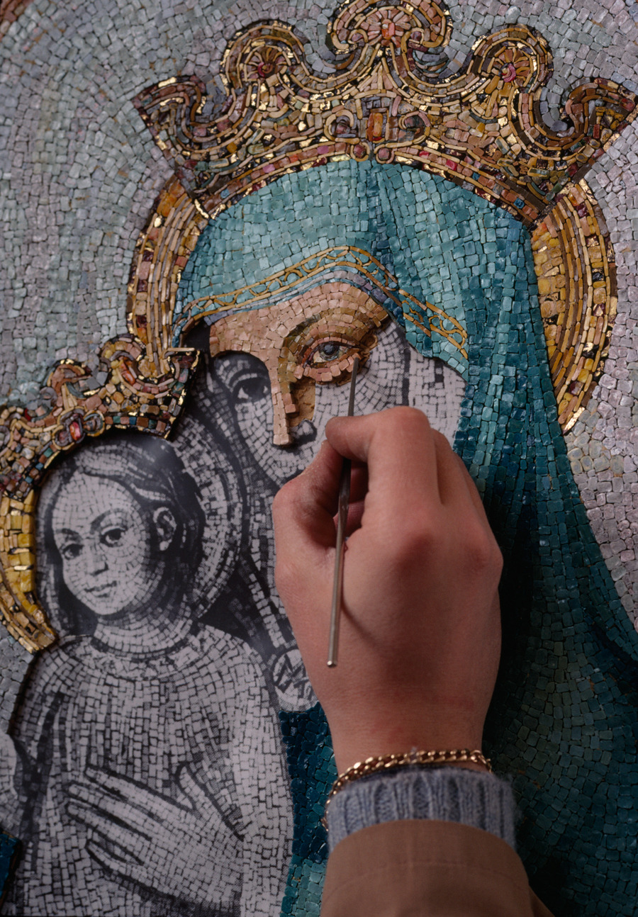 natgeofound:  A woman working on a mosaic of Mary and baby Jesus in Vatican City.Photograph