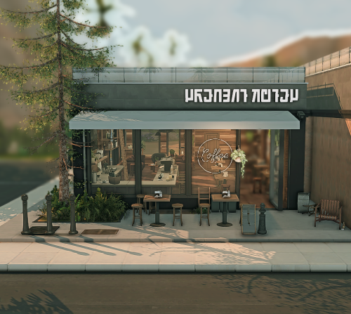 The Otterhouse A Quaint Coffee Shop, Right On The Road. With Big Modern Windows And A Rustic Interior,