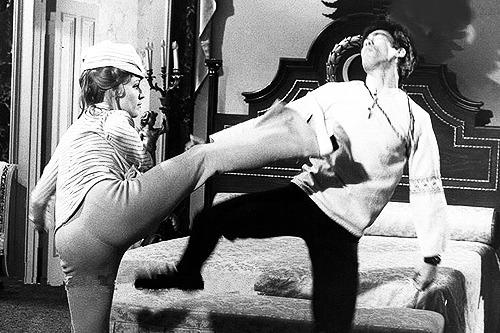 giablo69:  Bruce Lee working with Sharon Tate on the set of the Dean Martin’s Matt Helm film “The Wrecking Crew”, 1969. 