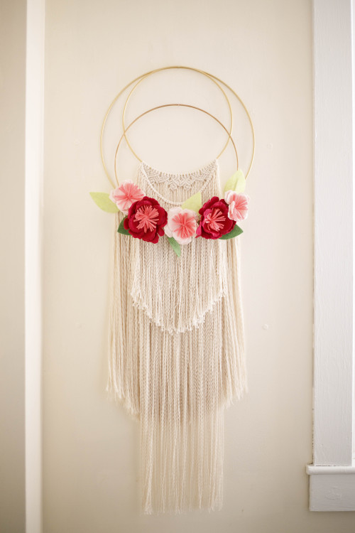 Trying to make our most inane spaces a little more beautiful. A custom macrame I started way back in