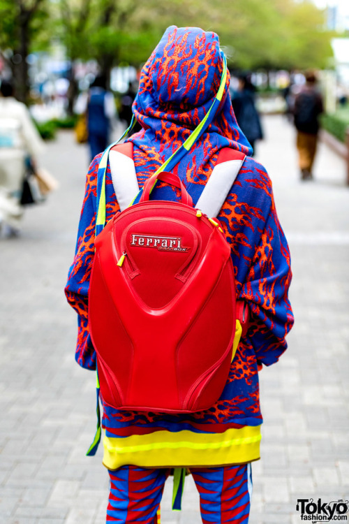 tokyo-fashion:  18-year-old Japanese fashion student Towy outside of Bunka Fashion College in Tokyo wearing colorful fashion by Bernhard Willhelm, Bernhard Willhelm sneakers, and a red Ferrari backpack. Full Look