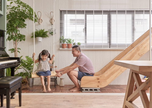 dezeen:  Taiwanese studio HAO Design installed a play area in the kitchen of this family home so the children could spend more time with their parents »