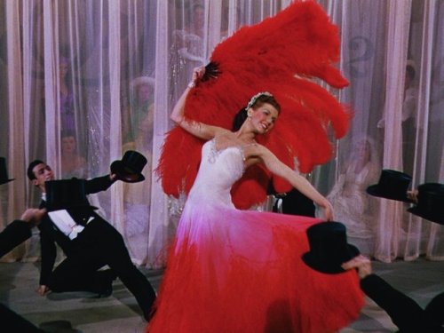 costumeloverz71: Nadine Hale’s (Ann Miller) red/white feathered gown. Easter Parade (1948). Co