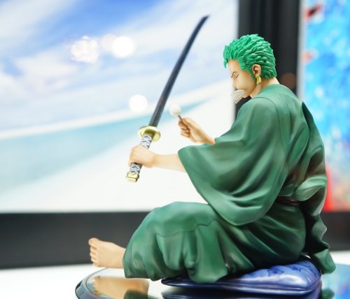 lawlullipop:  We finally see Zoro figure for on the Chair serie but … Zoro is not a chair but sitting and clean his sword… And look really big.source twitter twitter