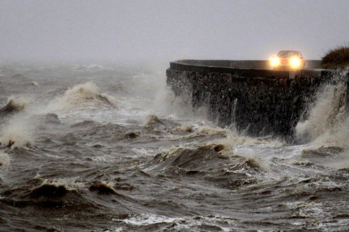 untrustyou:Strong winds and high tides battered a coastal road close to Newtownards, Northern Irelan