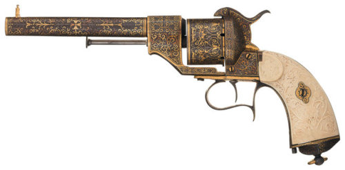 Gold damascened Spanish pinfire revolver with carved ivory grips, crafted by Placido Zuloaga. Inscri