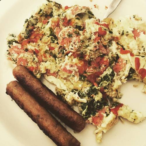 Spinach, lox, and egg white scramble with chicken breakfast sausage. A little #sriracha doesn&rs