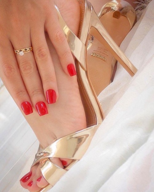 WOW! So gorgeous. Love the gold criss cross sandals and red nails