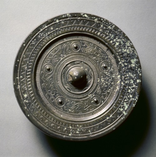 Mirror with Concentric Circles, an Immortal, and Auspicious Animals, 1st century BC-1st century AD, 