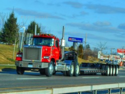 semitrckn:  Mack custom Superliner with a 4 axle lowboy 