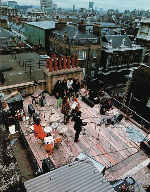 historicaltimes:The Beatles playing on top of Apple Headquarters at 3 Savile Row during their famous