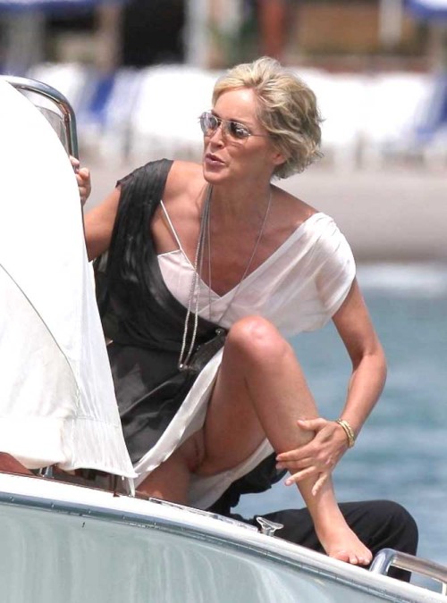 almostdressed: Sharon Stone is at it again. Yea