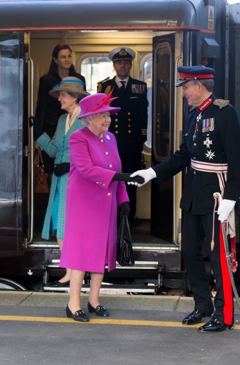 Queen Elizabeth II arrives at Plymouth Railway Station as she visits the city on March 20, 2015 in P