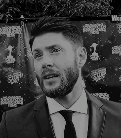 “Well, you know, it’s a really good cast, a fantastic crew. You know, we’re all like a family, so it’s just a great environment…” Jensen answered, nodding a little. There were people everywhere, cameras flashing and an excited chatter slowly rising...
