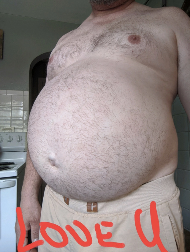 dadslunch:I walked in the living room, getting ready to leave for school, and saw my dad snap a quick photo of his abnormally large gut, that was also squirming. Faint screaming could be heard but I  just assumed it was the TV in the other room.My father