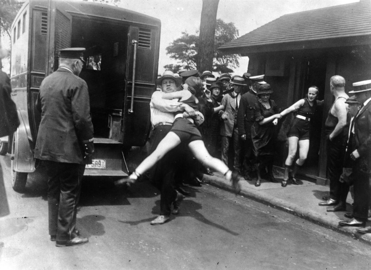 historicaltimes:  women in Chicago being arrested for wearing one piece bathing suits,