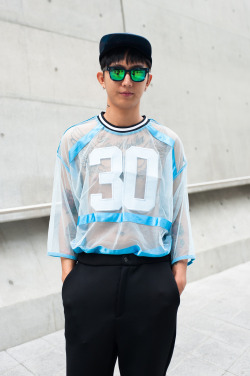 wgsn:  Sheer varsity top over tattoo for