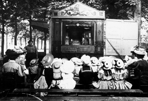 Children with the puppet Guignol, at  The Jardin du Luxembourg, or the Luxembourg Garden, Paris, 190