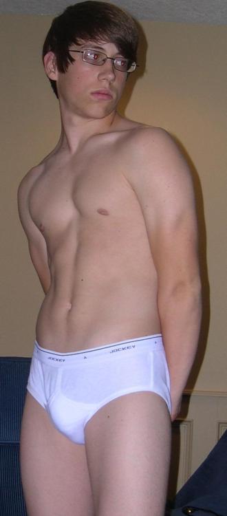 white-briefs-lover: The glasses make him look a bit like a nerd, but once he taken off his clothes a