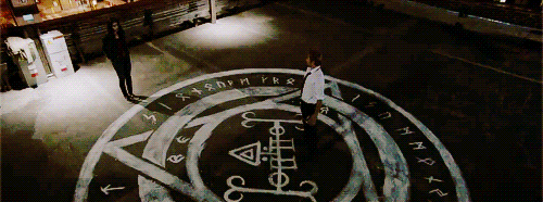 thelaughingmagician:  I’m the one who steps from the shadows, all trenchcoat and cigarette and arrogance, ready to deal with the madness. [x] 