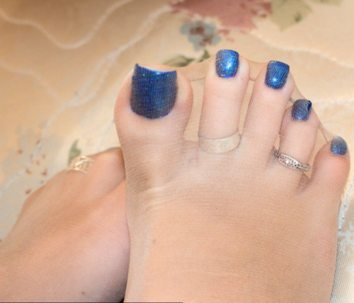 ifootman: tony6110: The immaculately pedicured sheer nylon covered toes of FootGoddess Ana Love them