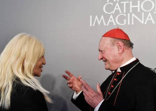 Donatella Versace speaks to Cardinal Gianfranco Ravasi, Vatican culture minister &amp; President of 