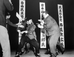 vakkomondor:  Otoya Yamaguchi withdraws his samurai sword after having assassinated Inejiro Asanuma, leader of the Japan Socialist Party, on October 12, 1960. 