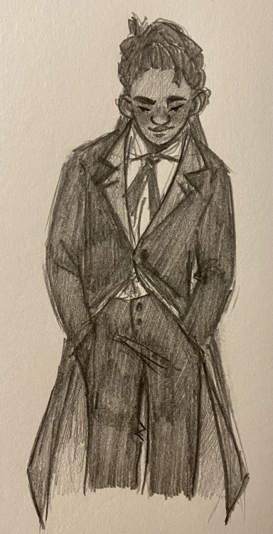 [Start I.D. A shaded sketch of Kravitz from the knees up.  He standing with a slight lean to one sid