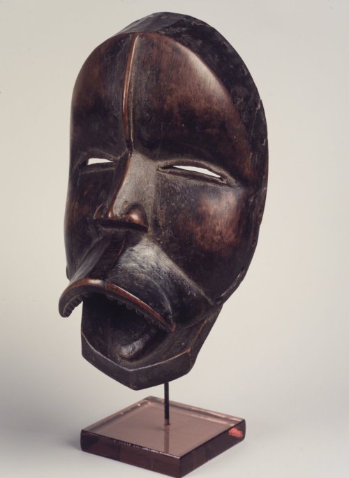 Mask of the Dan people, Liberia.  Artist unknown; late 19th or early 20th century.  Now in the Brook